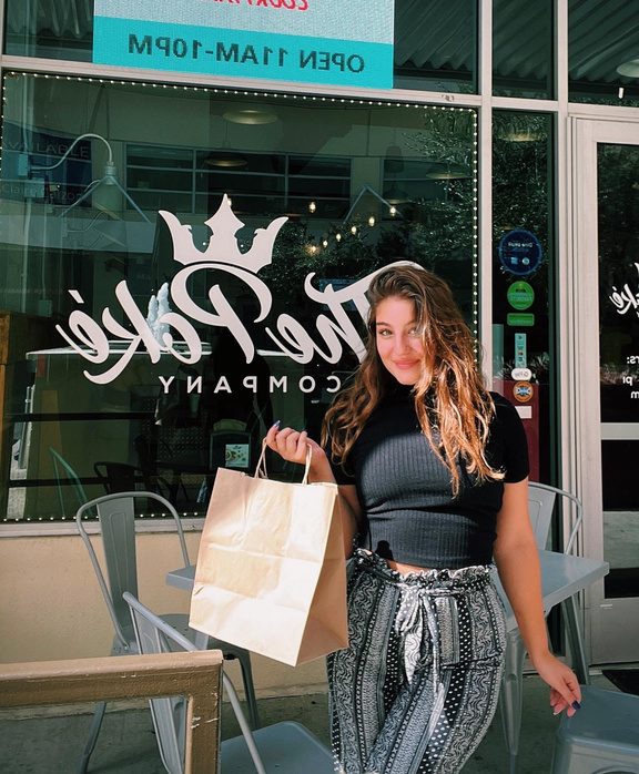 A Campus Connect ambassador outside The Poke Company